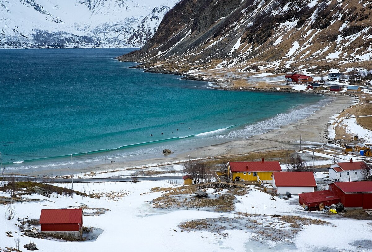 Surfers at Unstad Beach, Lofoten